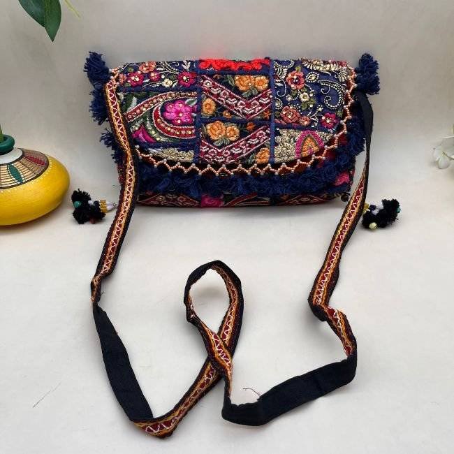 Karma Clutch 1 Karma Clutch Banjara Sling Bag - Image 1