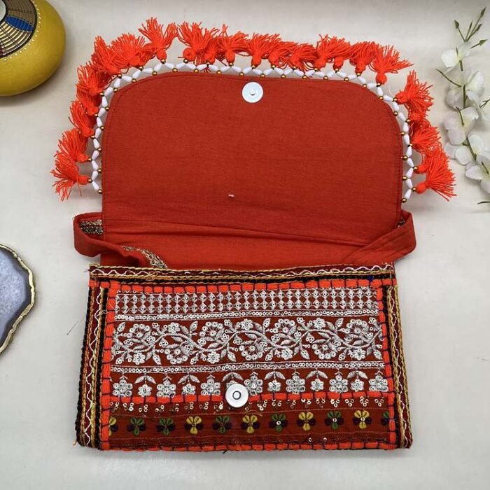 Kesariya Peaks Banjara Sling Bag - Inside view with magnetic clasp