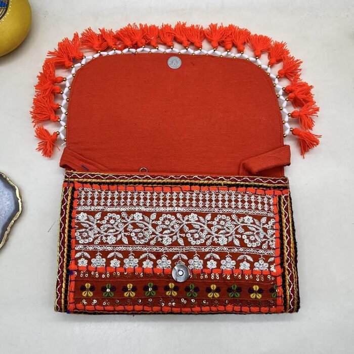Saffron Summit Banjara Sling Bag - Inside view with magnetic clasp